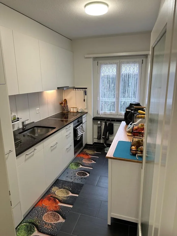 4-Zimmerwohnung im Erdgeschoss mit Sitzplatz