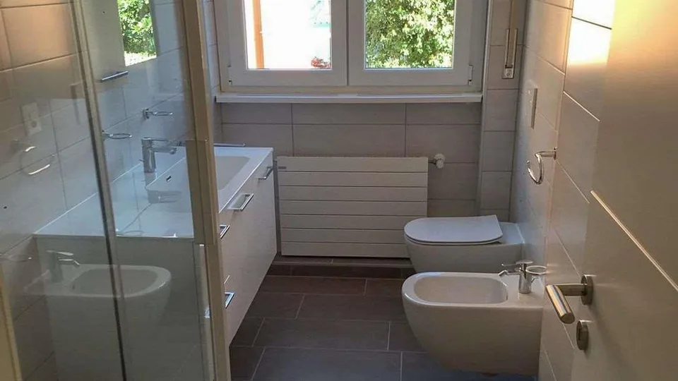 Lugano Ruvigliana: elegantes 3,5-Zimmer-Wohnung mit teilweisem Seeblick