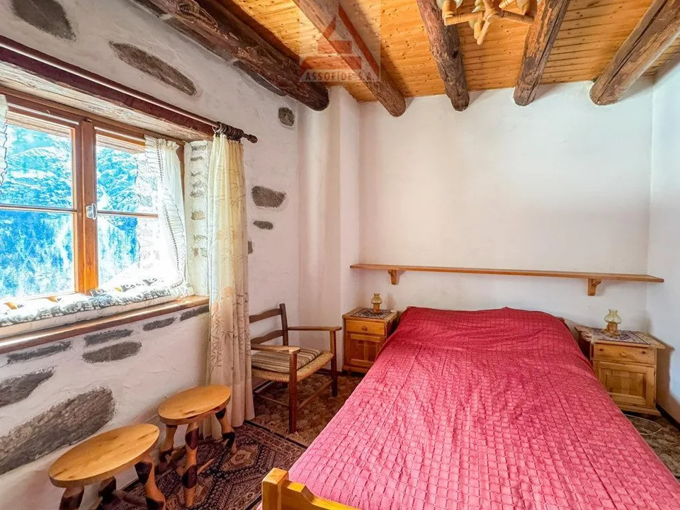 Ein Rückzugsort in den Bergen / Un rifugio tra le montagne