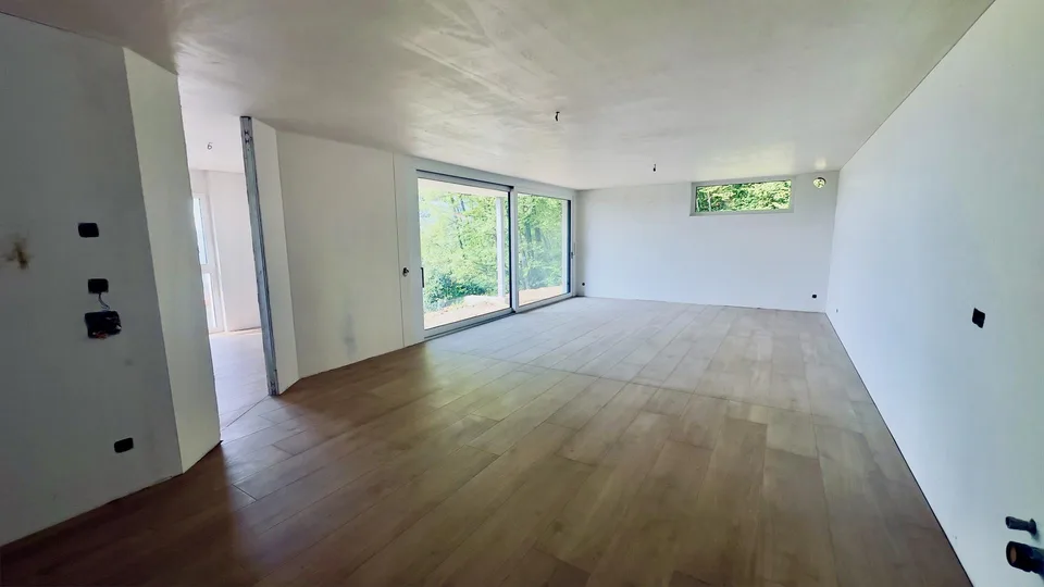 ESCLUSIVO E SPAZIOSO 4.5 LOCALI CON GIARDINO IN CAPRIASCA