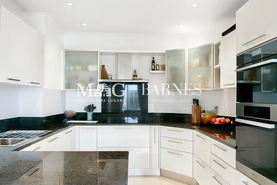 Lugano: Appartamento 5.5 locali con giardino e terrazzo privati – Foto 8 von 14