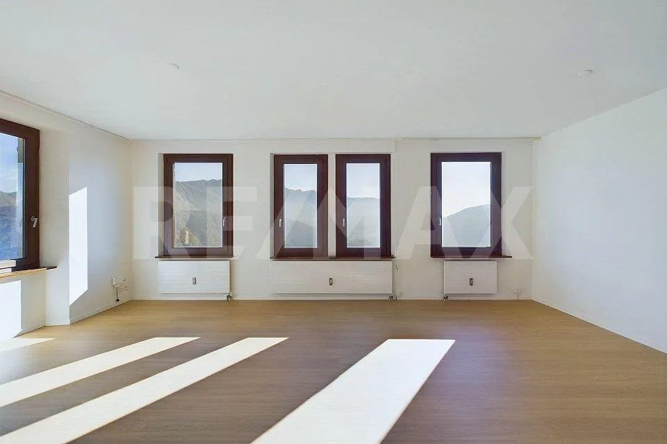 Tre appartamenti all'ultimo piano con vista lago e giardino – Foto 8 von 13