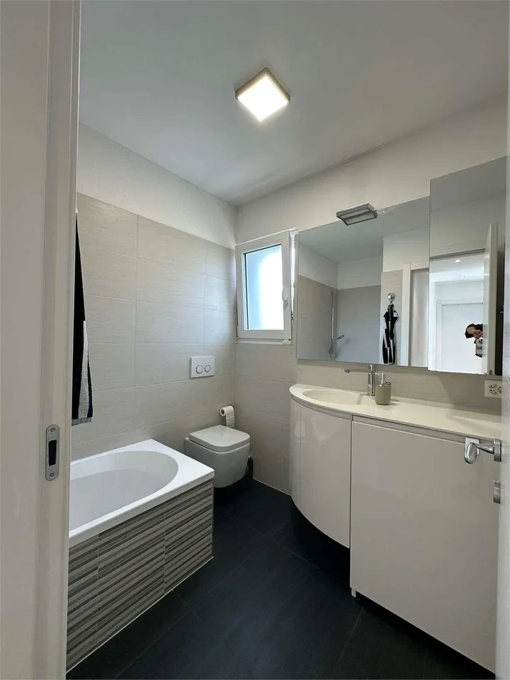 Elegante appartamento 4.5 locali con giardino a Cadempino. – foto 10 di 13