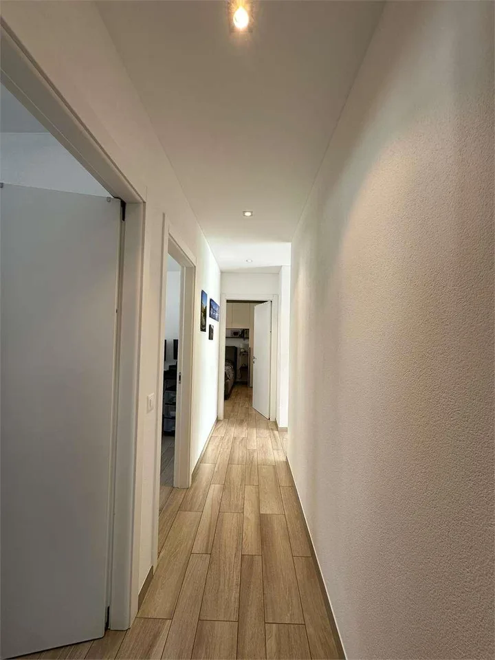 Elegante appartamento 4.5 locali con giardino a Cadempino. – foto 7 di 13