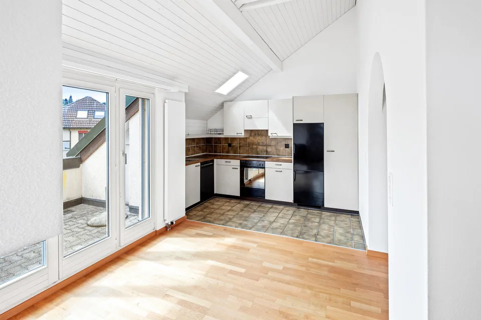 Appartement mansardé confortable dans une petite maison multifamiliale