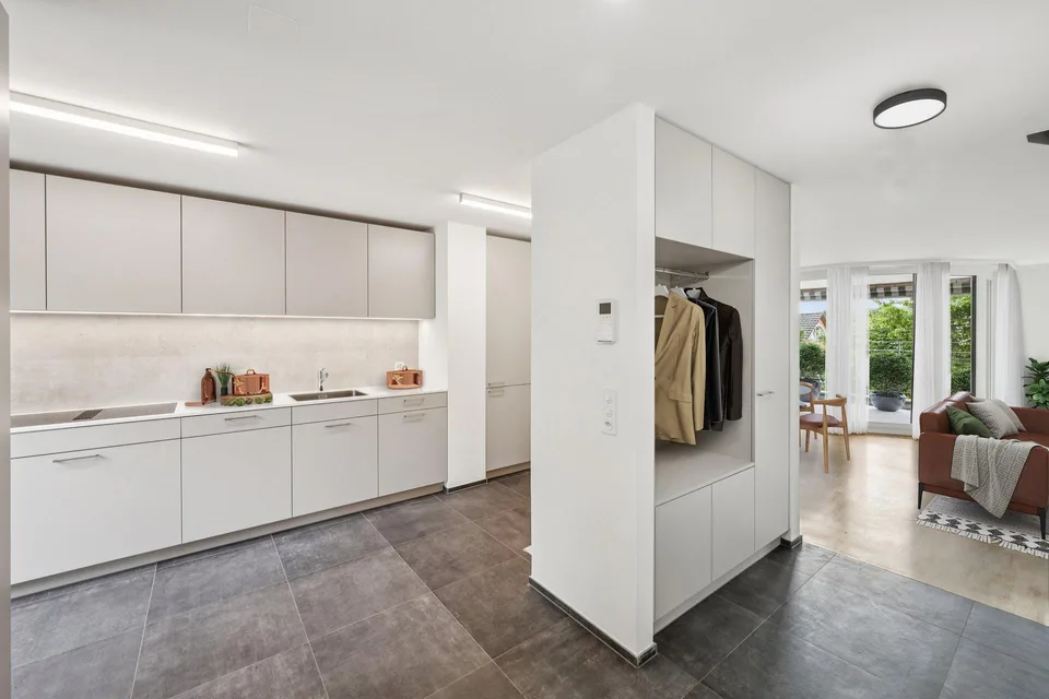 Erstbezug nach Sanierung -  Maisonettewohnung mit Gartensitzplatz