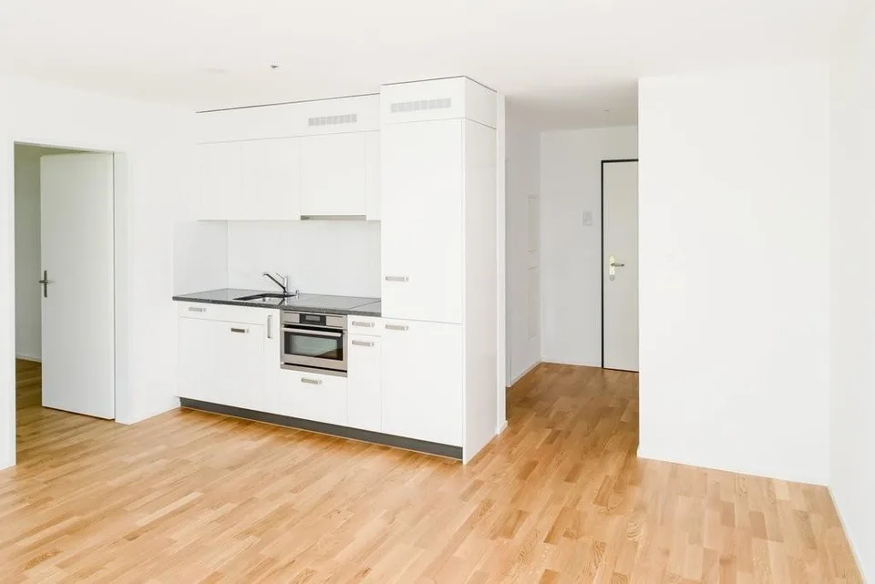 Moderne & helle Wohnung mit Gartensitzplatz