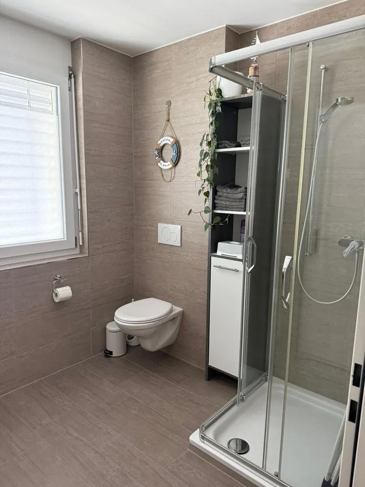 Appartamento mansardato moderno con grande terrazza in affitto