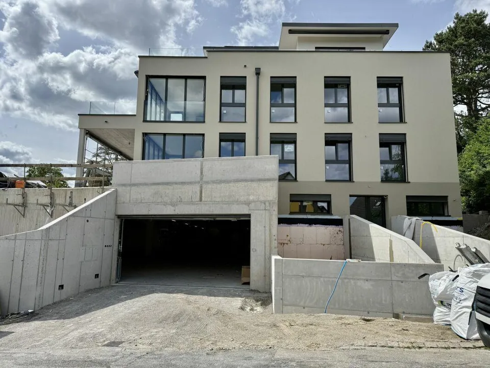 Erstbezug: Gartenmaisonettewohnung mit Einliegerwohnung