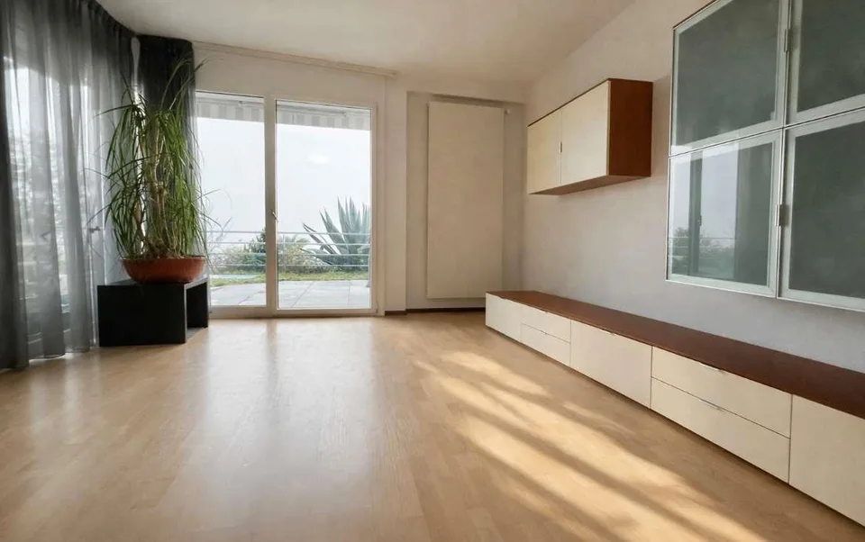 Appartement mit Seeblick und Gartenterrasse