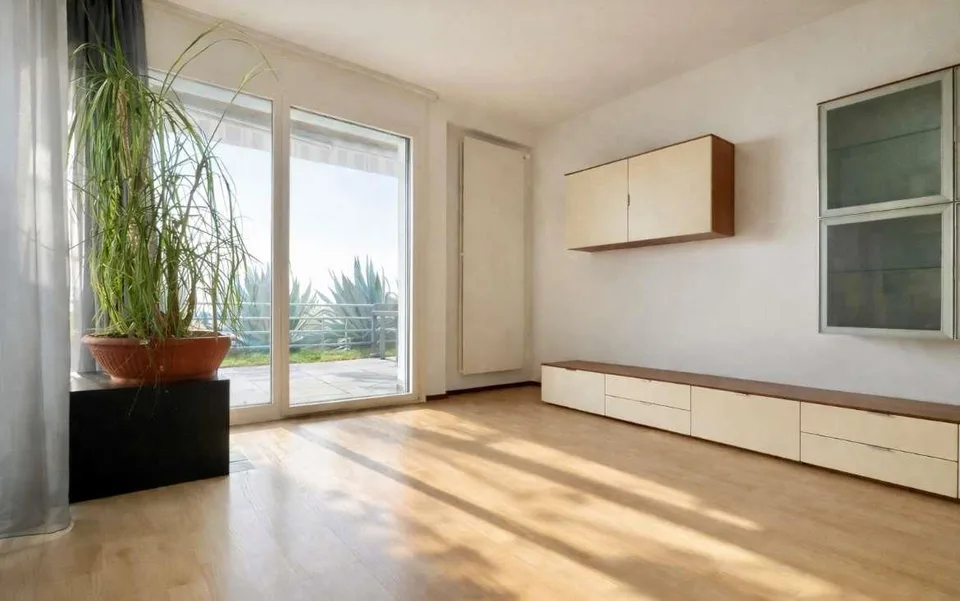 Appartement mit Seeblick und Gartenterrasse