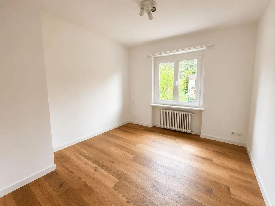 Moderno 2.5 locali con studio, cantina e posto auto esterno – Foto 7 von 8