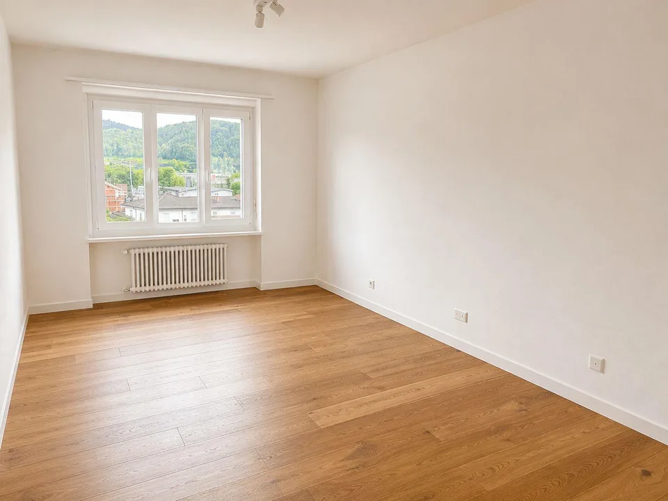 Moderno 2.5 locali con studio, cantina e posto auto esterno