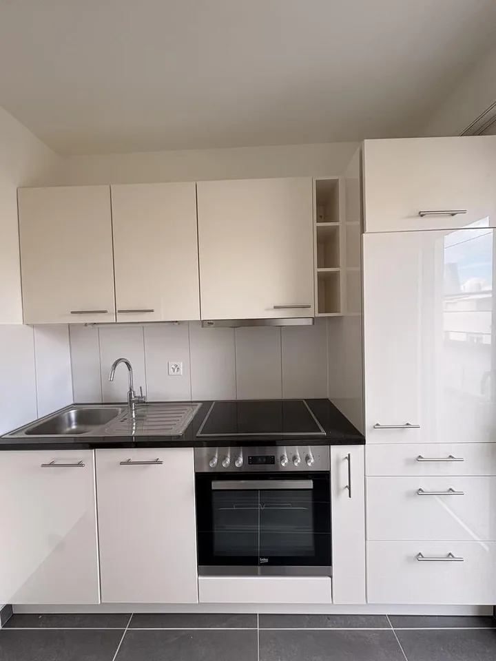 Charmante Wohnung im obersten Stock mit grossem Balkon