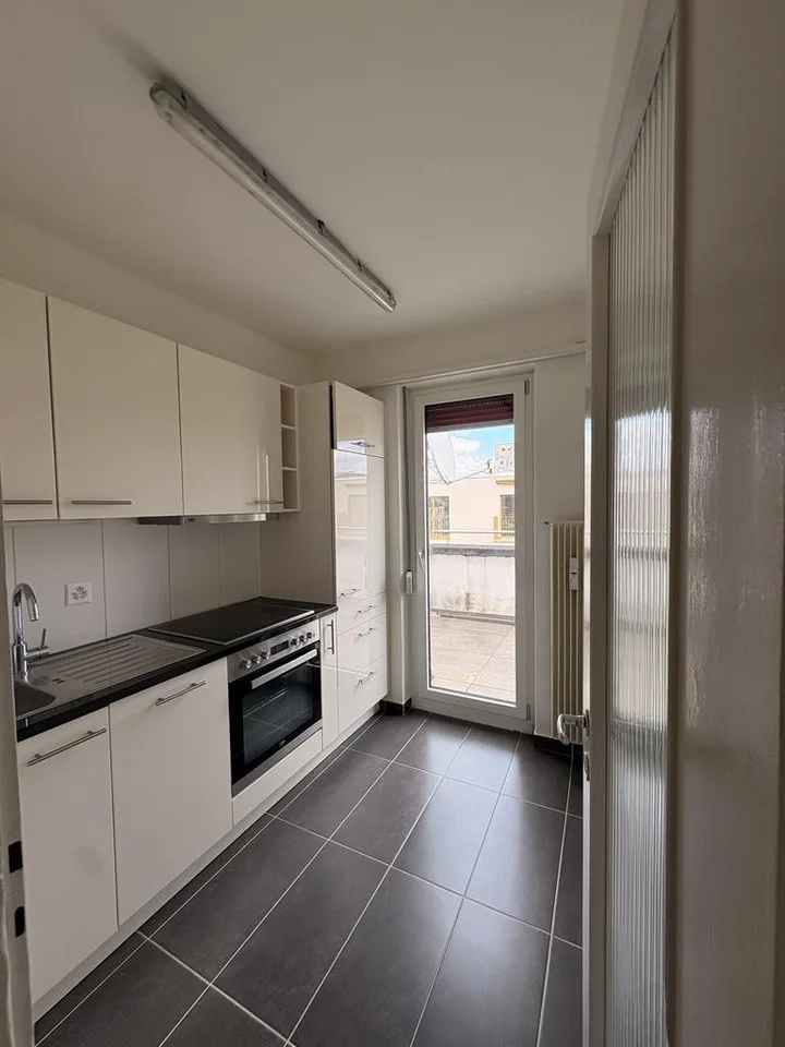 Charmante Wohnung im obersten Stock mit grossem Balkon