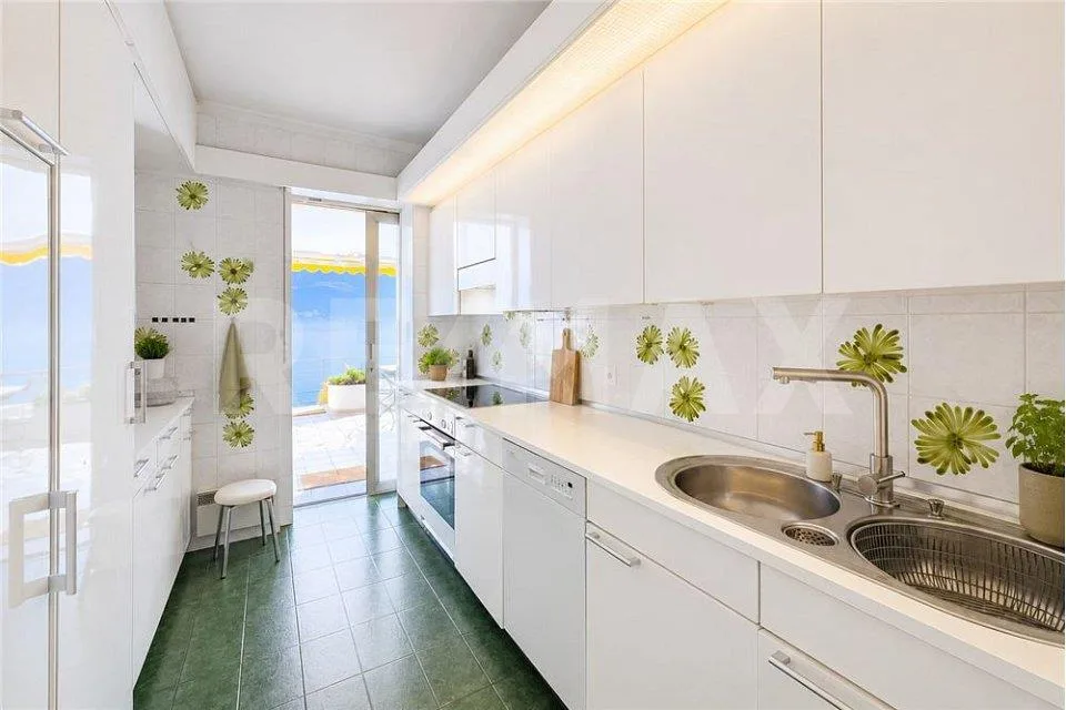Wunderschöne 4.5-Zimmer-Wohnung mit Garten und Seeblick – Foto 6 von 11