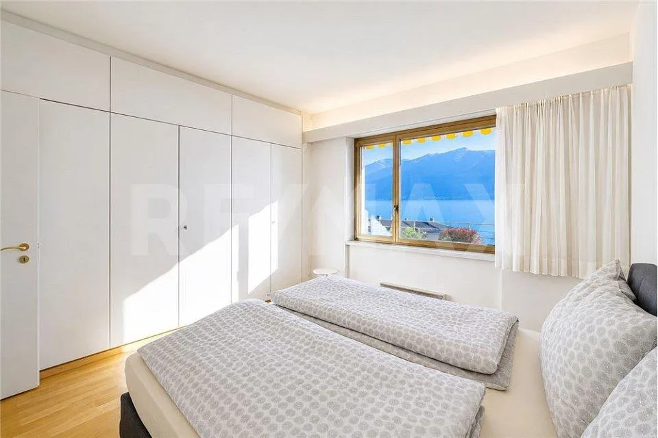 Wunderschöne 4.5-Zimmer-Wohnung mit Garten und Seeblick – Foto 7 von 11