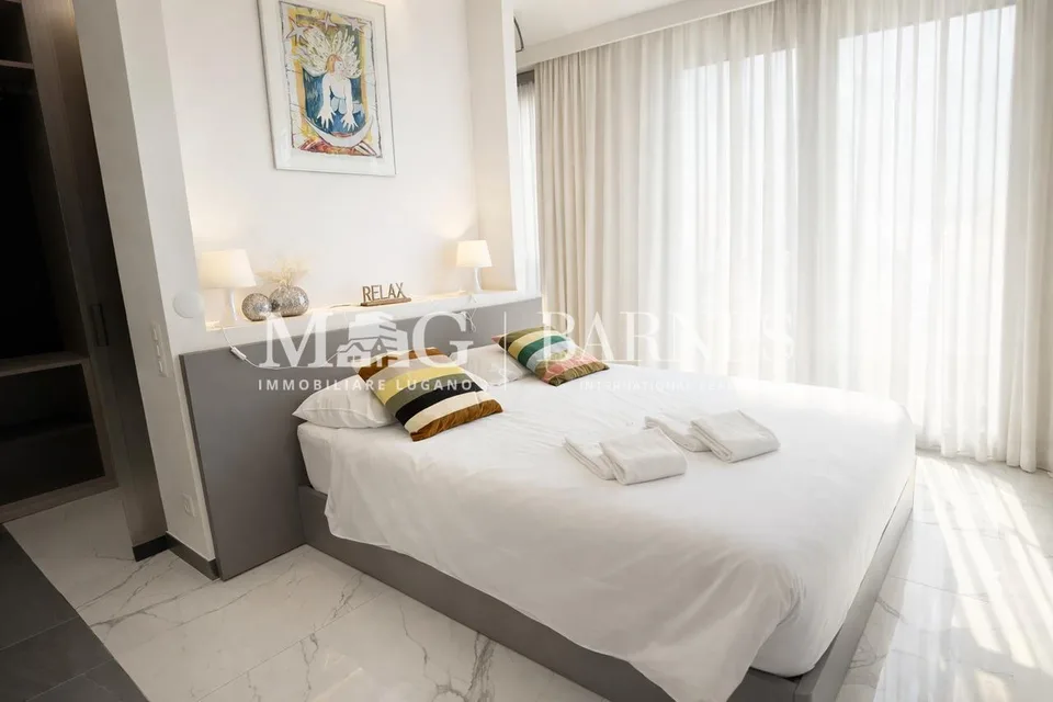 Bissone: Appartamento 3.5 locali con vista lago e terrazzo – Foto 11 von 15