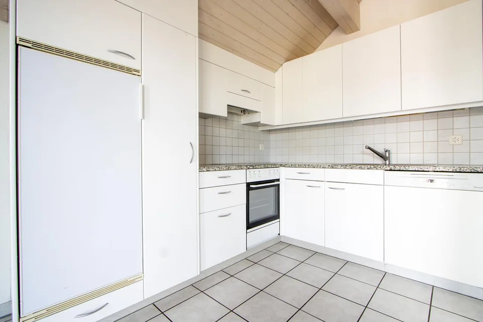 Appartamento mansardato di 3,5 locali con balcone