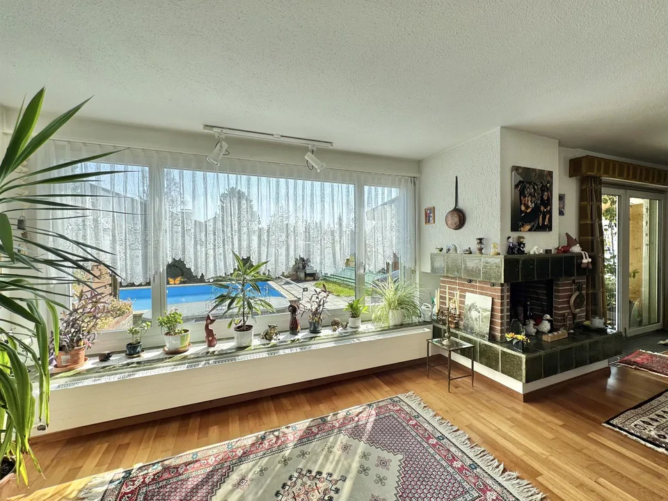 Moitié de maison individuelle avec piscine communautaire