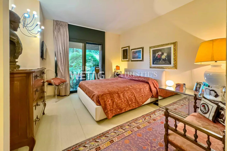 In vendita a Lugano-Gentilino: appartamento elegante con giardino privato & vista parziale sul lago di Lugano
