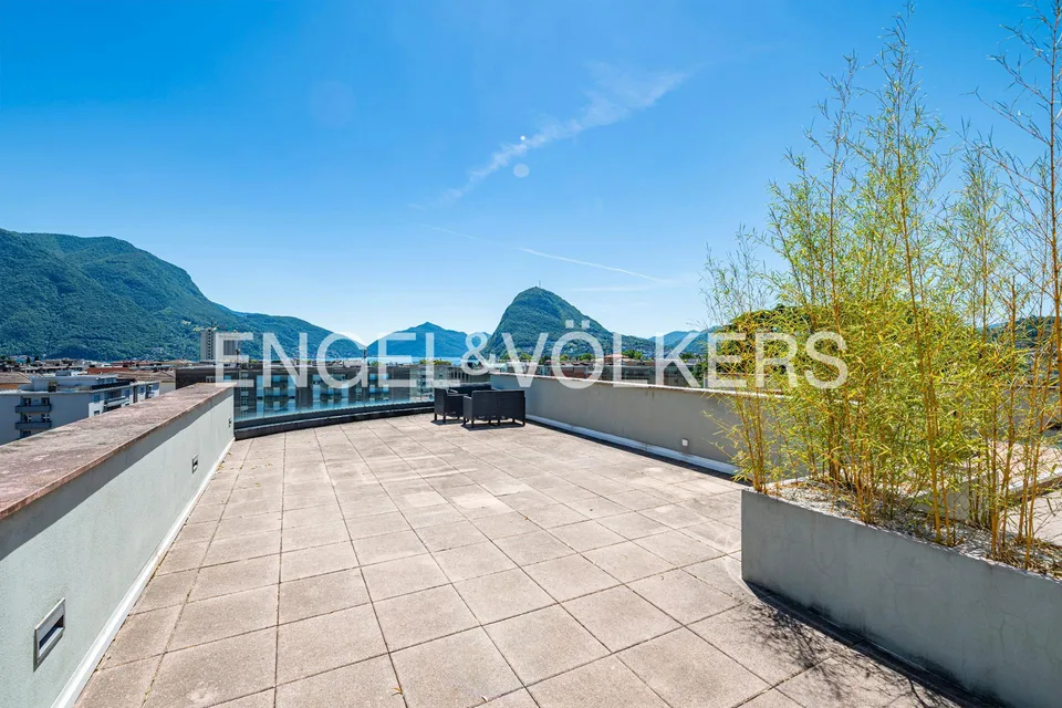 Meravigliosa terrazza rooftop con vista lago – foto 13 di 13