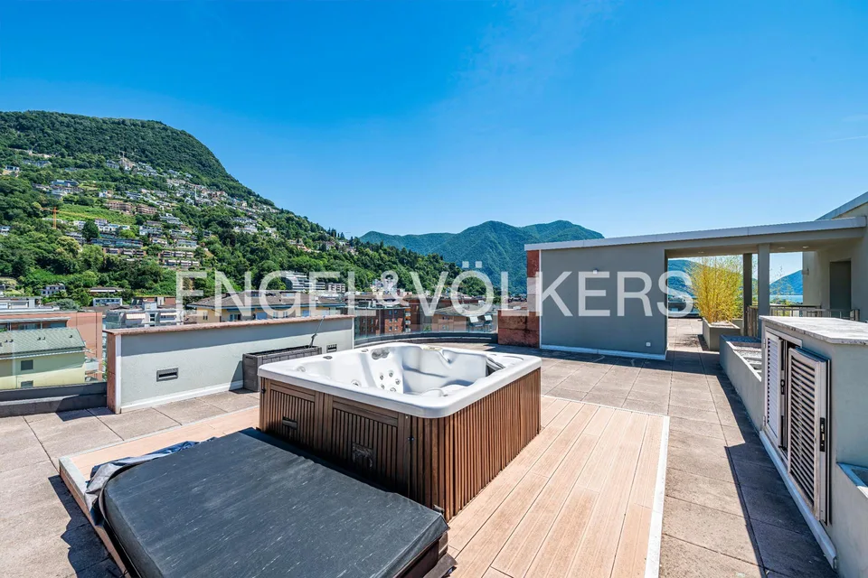 Meravigliosa terrazza rooftop con vista lago – foto 12 di 13
