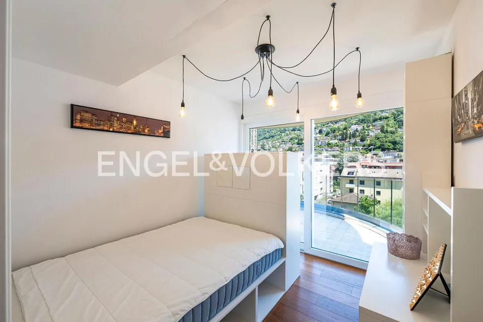 Meravigliosa terrazza rooftop con vista lago – foto 8 di 13