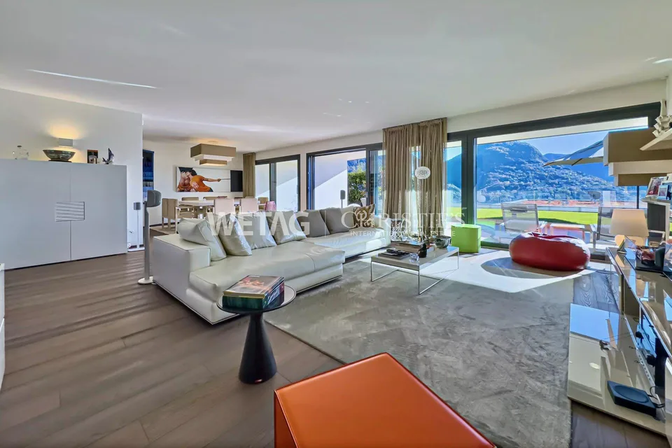 Appartamento a Porza con giardino privato & vista sul lago in vendita - anche utilizzabile come seconda casa