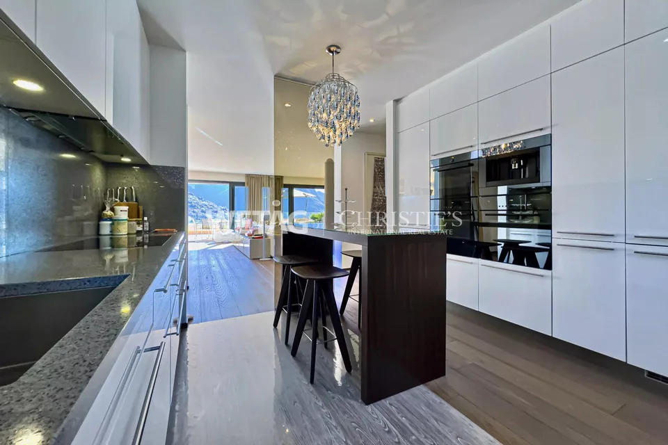 Appartamento a Porza con giardino privato & vista sul lago in vendita - anche utilizzabile come seconda casa