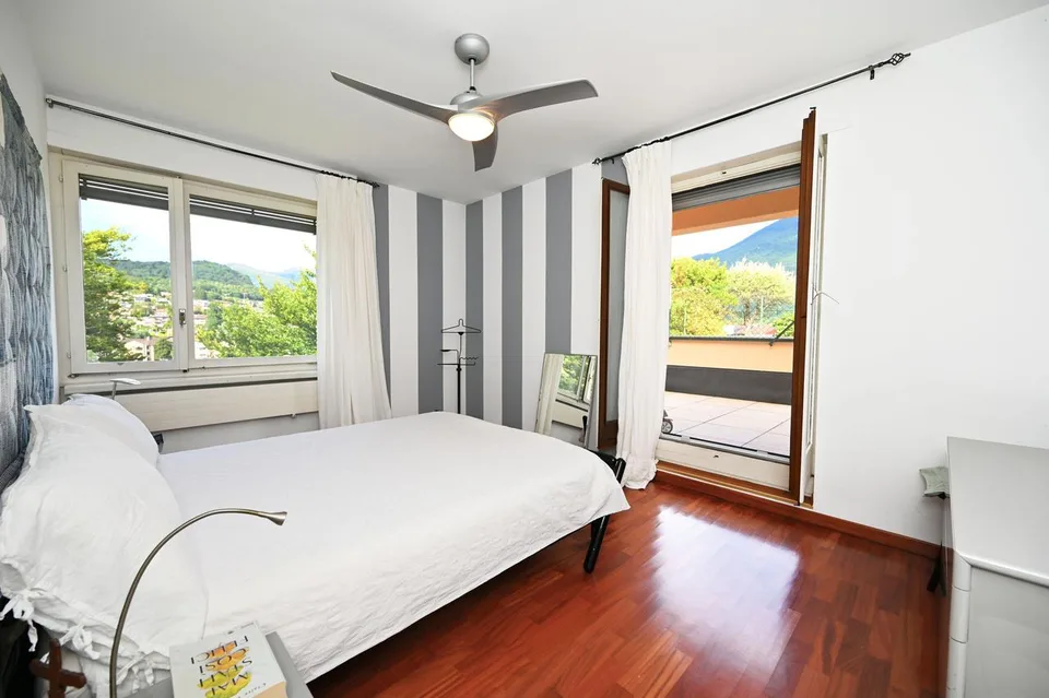 4.5 Zimmer Attikawohnung in Porza – Foto 9 von 18
