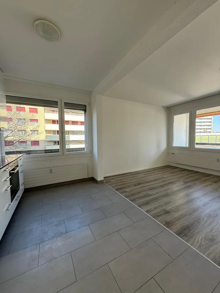 Appartement lumineux de 3,5 pièces au 1er étage avec balcon