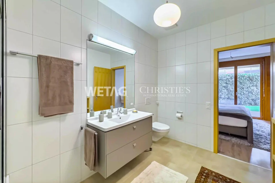 Au cœur d'Ascona, appartement moderne avec jardin privé à vendre – photo 7 sur 13