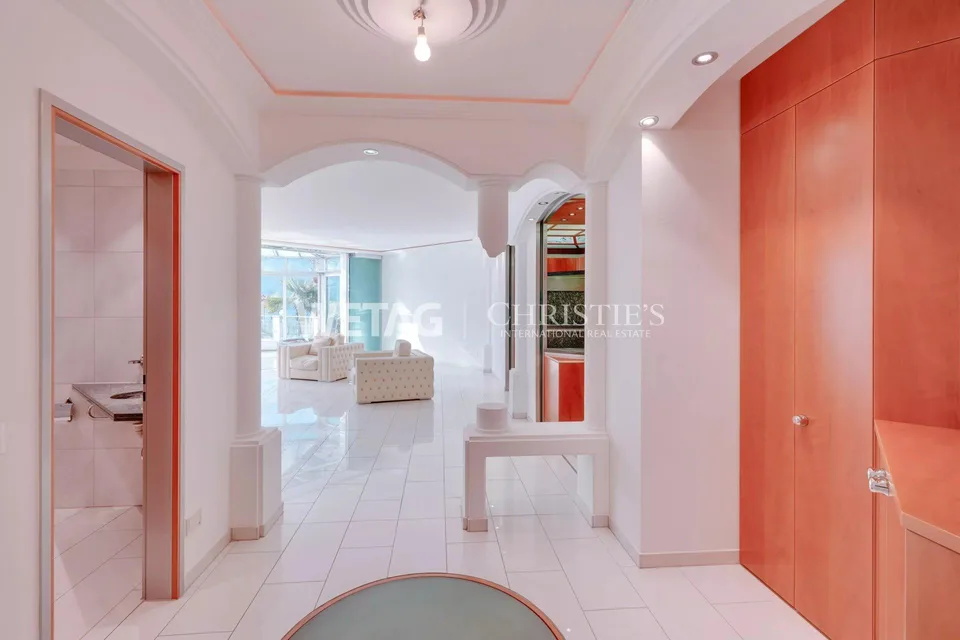 Muralto: Modern, bright apartment with large terrace & elegant glass architecture for sale