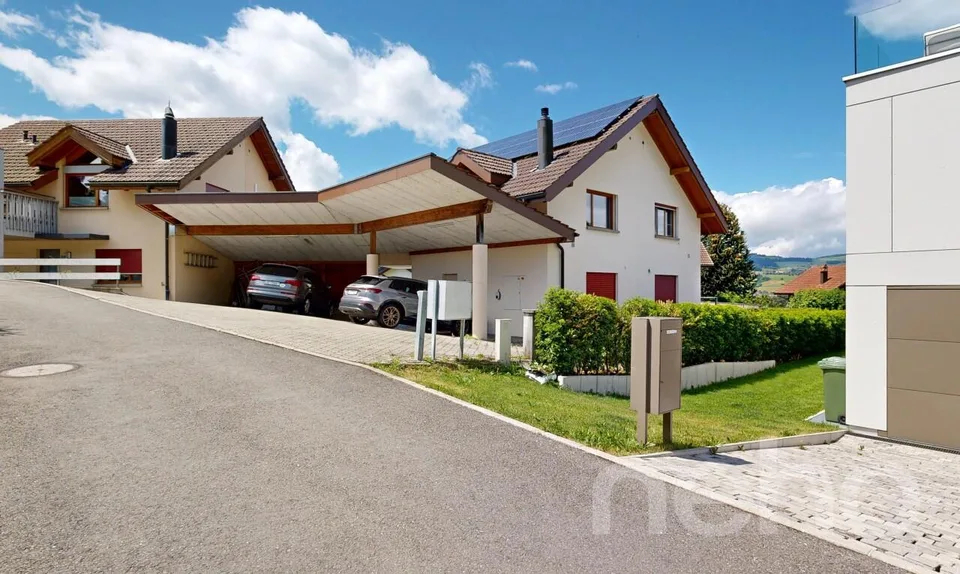 Semi-Detached House with Double Carport and Photovoltaic System