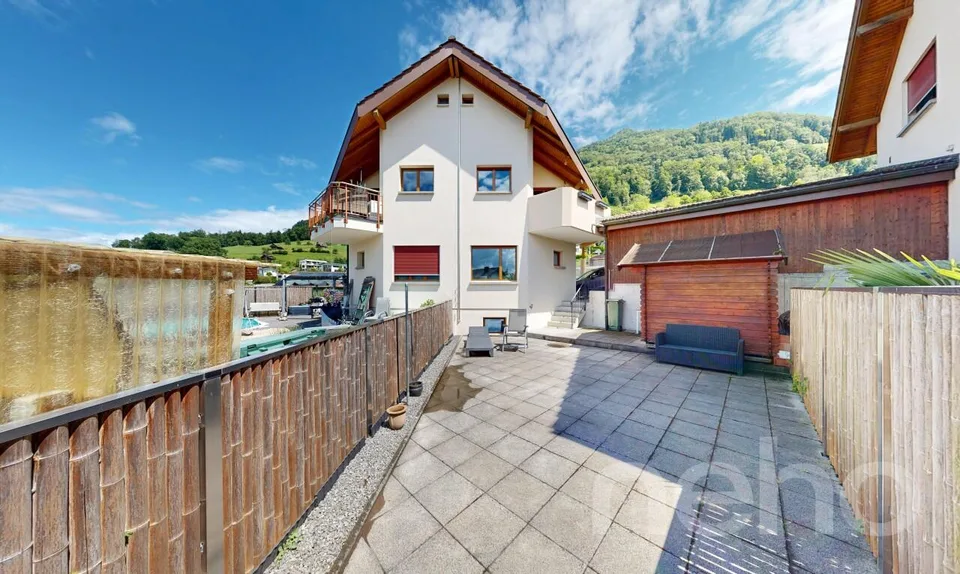Semi-Detached House with Double Carport and Photovoltaic System