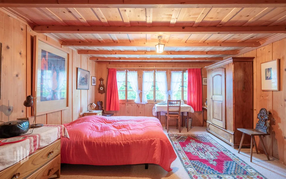 ImmoWyss - Chalet charmant avec grande réserve de terrain constructible et vue sur le Niesen