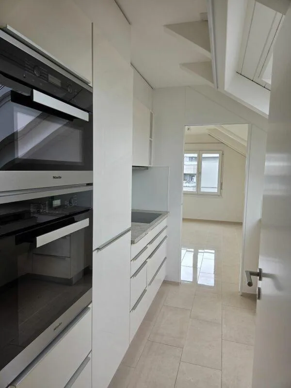 Superbe appartement en attique dans un emplacement central