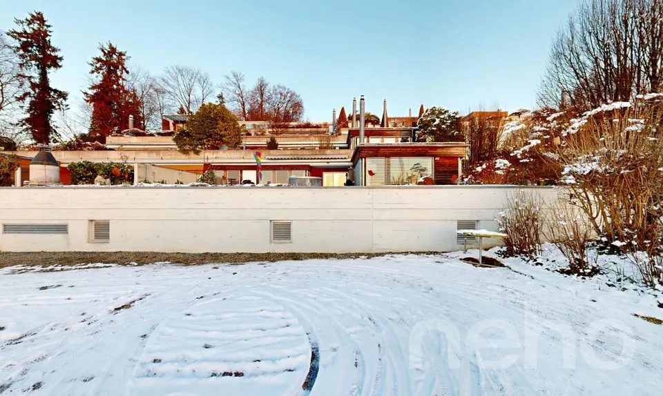 Terrassenwohnung auf zwei Ebenen mit Wintergarten und Panorama
