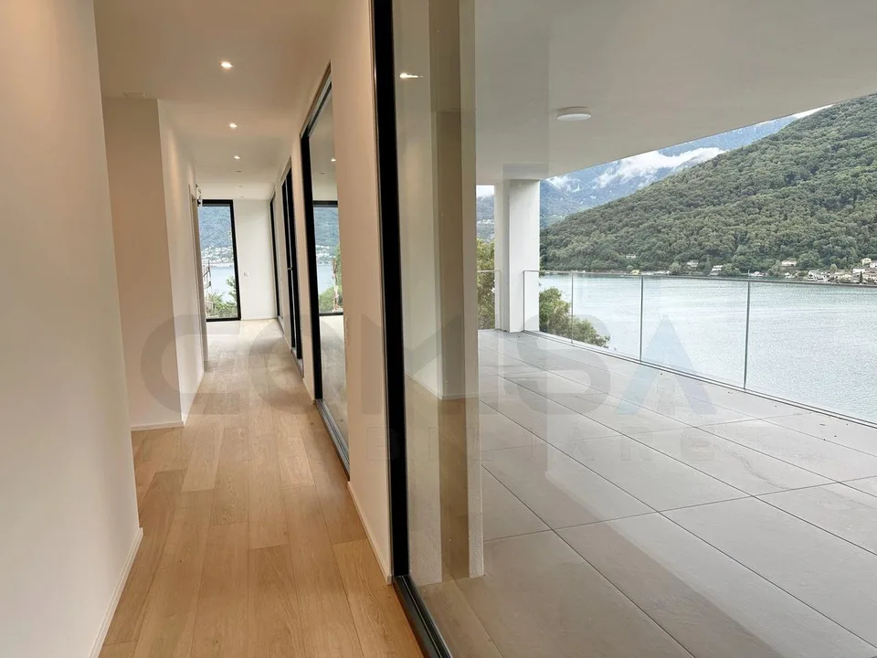 MAGNIFICENT VILLA 7.5 ROOMS WITH DREAM VIEW IN VICO MORCOTE