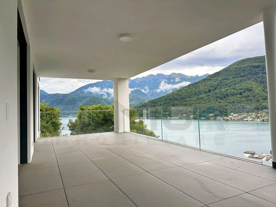 MAGNIFICENT VILLA 7.5 ROOMS WITH DREAM VIEW IN VICO MORCOTE