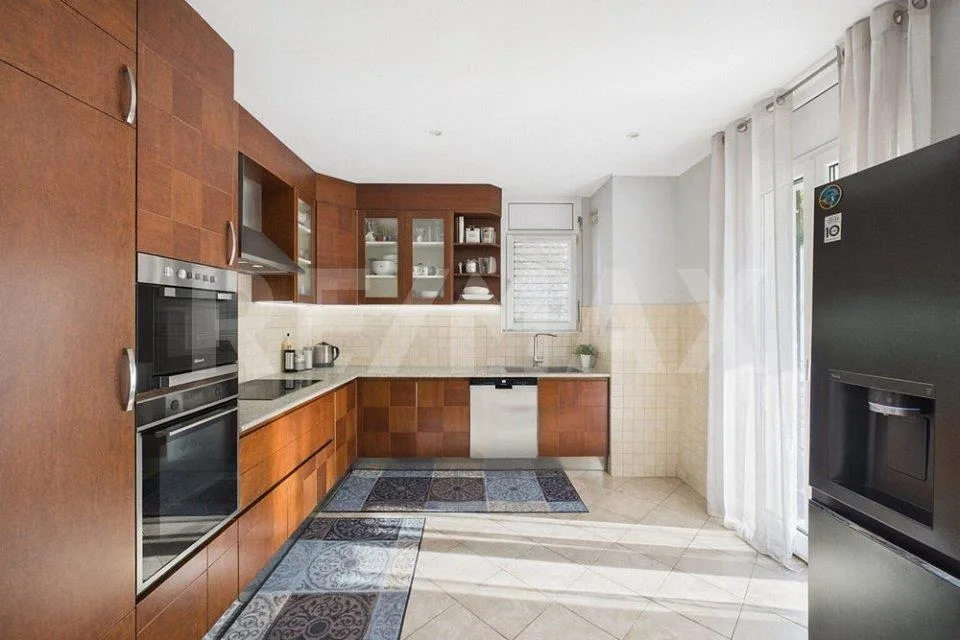 Appartamento 4½ locali al piano terra con giardino privato