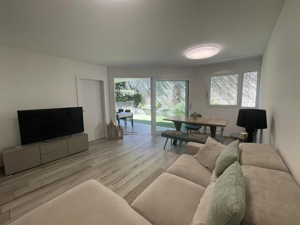 RECENT UND MODERNES 3.5-ZIMMER-WOHNUNG MIT KLEINEM GARTEN IN SORENGO