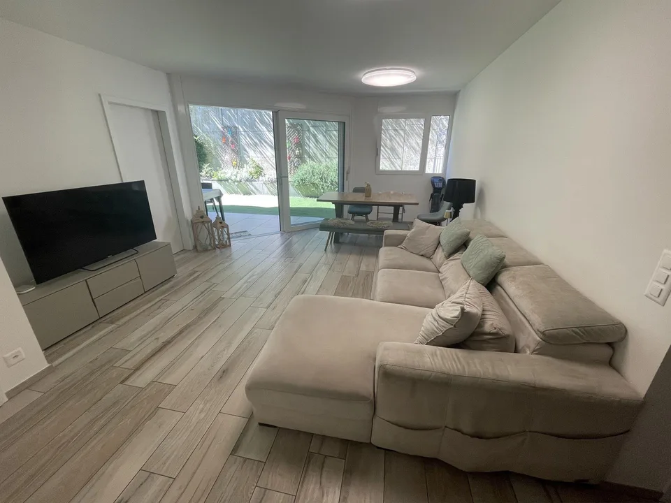 RECENT UND MODERNES 3.5-ZIMMER-WOHNUNG MIT KLEINEM GARTEN IN SORENGO