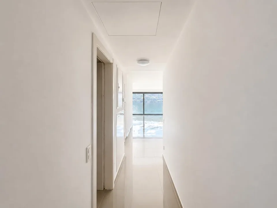 BRISSAGO - VERKAUFT HELLES 3.5-ZIMMER-WOHNUNG MIT ATEMBERAUBENDER SEEVIEW