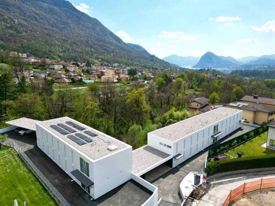 Appartamento con terrazza e splendida vista su Lugano e le montagne – Foto 6 von 11