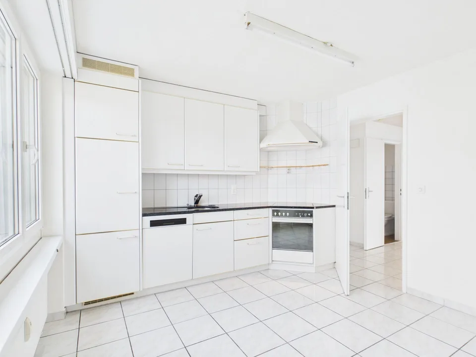 Appartamento familiare di 4,5 stanze con balcone e garage