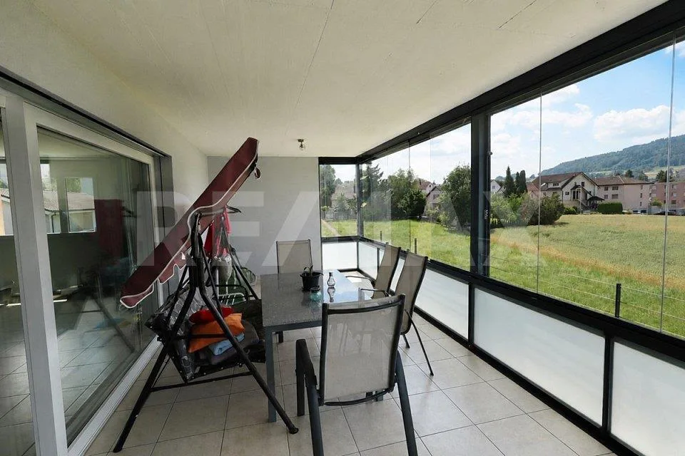 Grosszügige 4.5-Zimmer-Eigentumswohnung mit verglastem Balkon in Re...