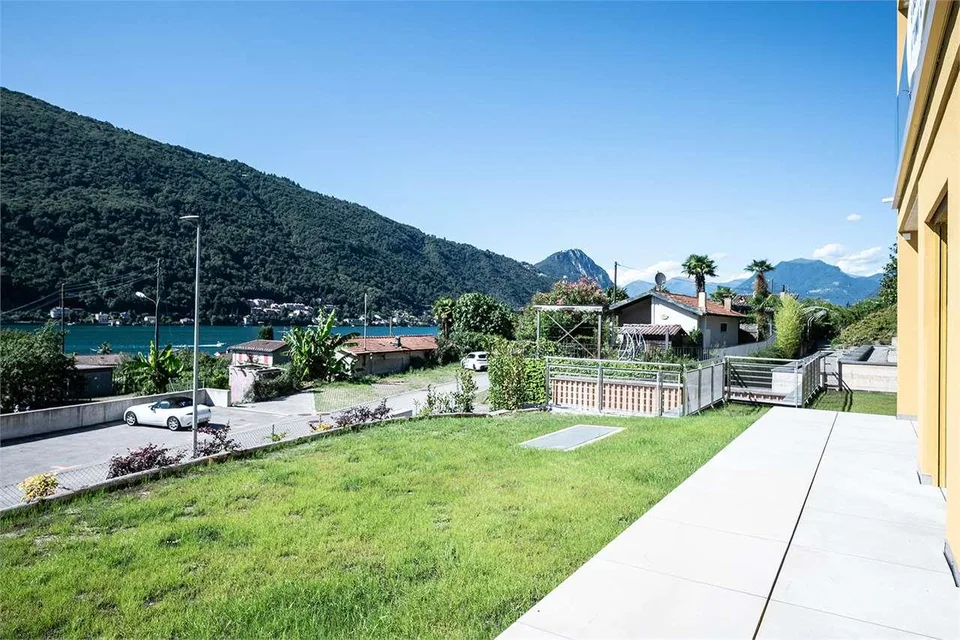 Elegante 4.5 locali con giardino e vista lago mozzafiato