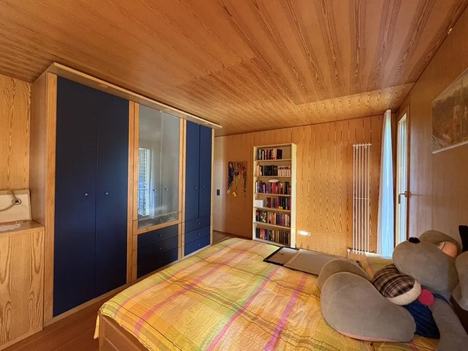 Casa di design in legno immersa nel verde – Foto 11 von 30